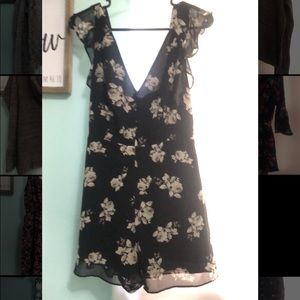 JustFab black and grey floral romper. Medium